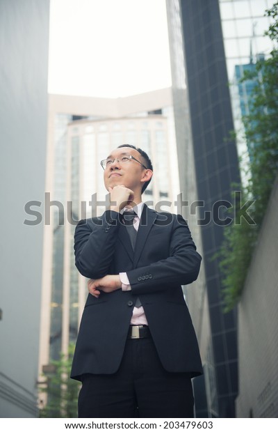 hong
kong businessman in busy central district
street