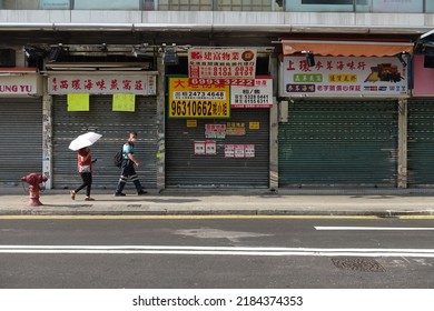 Hong Kong, China - April 26, 2022: City Street View Of Yuen Long And The People Wear Mask In Hong Kong.