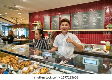 HONG KONG, CHINA - CIRCA JANUARY, 2019: Indoor Portrait Of A Worker At Pret A Manger In Elements Shopping Mall. Pret A Manger Is An International Sandwich Shop Chain.