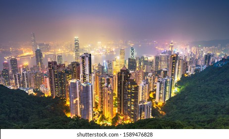 Hong Kong, China Cityscape from Victoria Peak at night.