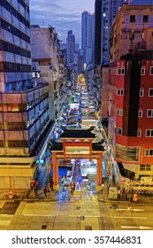 HONG KONG, CHINA - DEC 27, 2015: Crowded people walk through the market on December 27, 2015 in Mong Kok, Hong Kong. Mong Kok, Hong Kong is the highest population density place in the world.