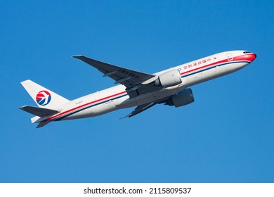 Hong Kong, China - December 1, 2013: China Cargo Boeing 777-200 B-2077 Cargo Plane Departure And Take Off At Hong Kong Chek Lap Kok Airport