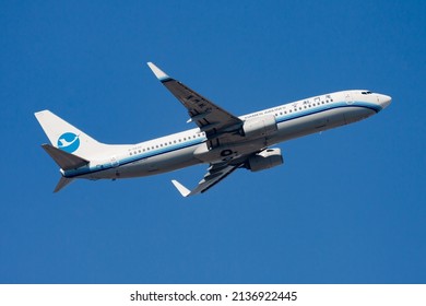Hong Kong  China - December 1, 2013: Xiamen Airlines Boeing 737-800 B-5632 passenger plane departure and take off at Hong Kong Chek Lap Kok Airport