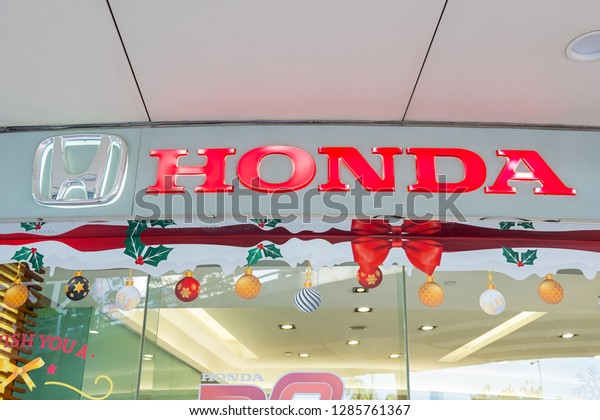 Hong Kong, China-\
December 18, 2018: The emblem Honda logo on a facade. Honda is a\
japanese car manufacturer.\
