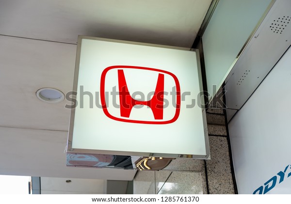 Hong Kong, China-
December 18, 2018: The emblem Honda logo on a facade. Honda is a
japanese car manufacturer.
