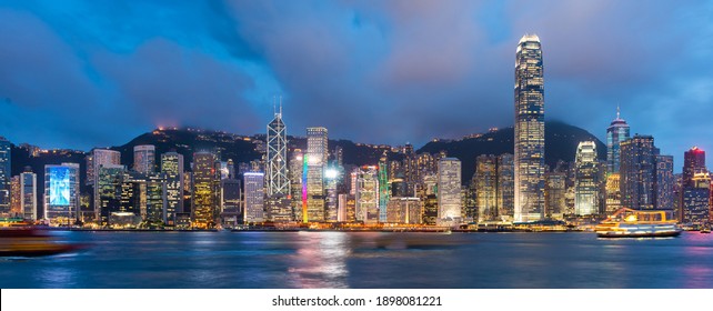 Hong Kong, China downtown cityscape from the harbor at dusk. - Powered by Shutterstock