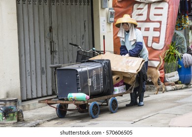 Hong Kong, China. January 16 2017. A Street Cleaner In The Streets Of Tai O Village