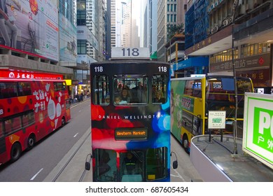 HONG KONG, CHINA - JANUARY 26, 2017: Two double-deck busses in Hong Kong, China. The Double-deck trams system in Hong Kong is one of three and the most famous in the world