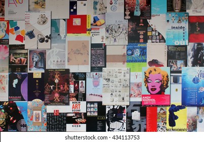 Hong Kong, China - March 15, 2014:posters and illustrations on the wall of a residential building in Hong Kong