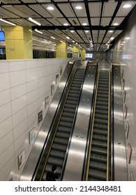 Hong Kong, China - March 4, 2022: Escalator Way To Train Platform At Nam Cheong MTR Station Hong Kong