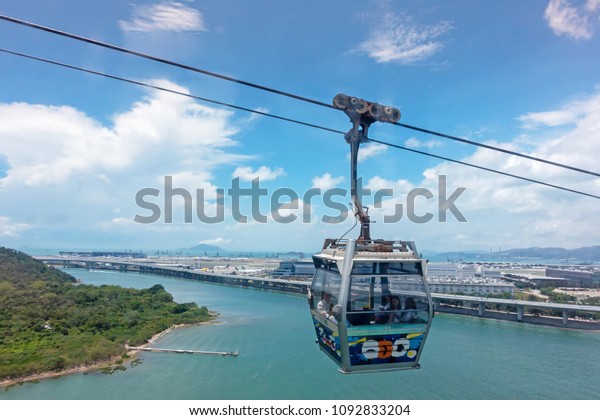 HONG KONG, CHINA - MAY 5, 2018:\
People are on Cable car Ngong Ping 360 to Lantau Island in Hong\
Kong. Popular public transportation from Tung Chung Station.\
\
