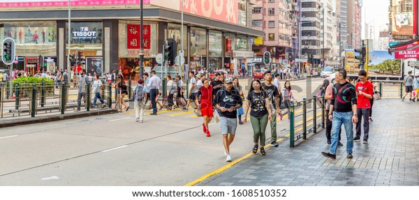 Hong Kong, China - November 14th, 2019: Streets of\
Hong Kong.Hong Kong became a colony of the British Empire after the\
First Opium War.
