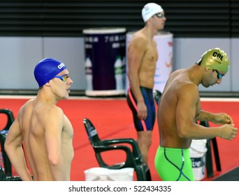 Hong Kong, China - Oct 29, 2016. Mitch LARKIN (AUS) And Omar PINZON (COL) At The Start. FINA Swimming World Cup, Preliminary Heats, Victoria Park Swimming Pool.