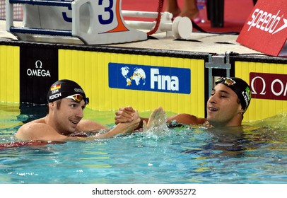 Hong Kong, China - Oct 30, 2016. Competitive swimmer LIMA Felipe (BRA) and KOCH Marco (GER) after the Men's Breaststroke 100m Final. FINA Swimming World Cup, Victoria Park Swimming Pool