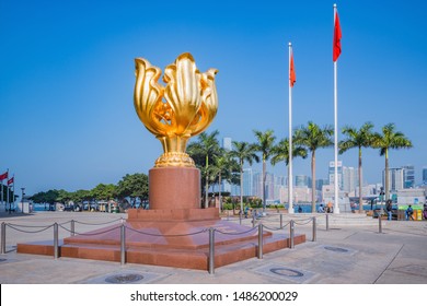 Hong Kong - December 15, 2016: Colden Bauhinia Flower Statue On Golden Bauhinia Square At Sunny Day Time. Wan Chai District.