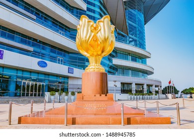 Hong Kong - December 15, 2016: Colden Bauhinia Flower Statue On Golden Bauhinia Square At Sunny Day Time. Wan Chai District.