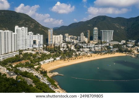 Hong Kong: Dramatic landscape of Repulse bay with its sandy beach and luxury condominium in Hong Kong island