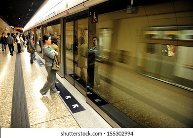 HONG KONG - FEB 12:Residents Of The HK Special Administrative Region Travels By MTR On Feb 12 2009.It's One Of The Most Profitable Railway In The World, With A High Fare Recovery Ratio Of 186%.