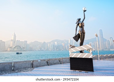 Hong Kong - February 9, 2015: Anita Mui statue in Avenue of Stars. In the distance is Victoria Harbour. Located in the Avenue of Stars, Hong Kong.