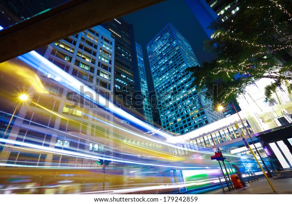 Hong\
Kong of highway with heavy traffic at  station\
night