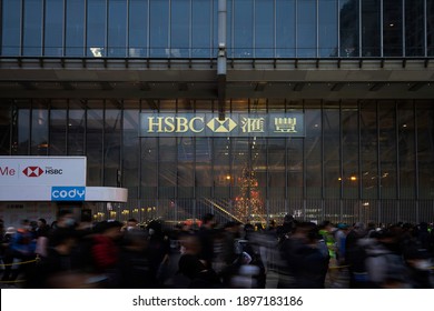 Hong Kong - Jan 1st 2020: Protesters Pass The HSBC Headquarter In Hong Kong. As The Largest Bank In The City, It Is Acused By Protesters To Assist The Police To Crack Down The Protest. 