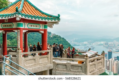 Hong Kong - January 12, 2016: Observation Deck With Ornate Pagoda On Victoria Peak In Hong Kong Is Visited By Millions Of People A Year To Enjoy Beautiful Scenery Of Victoria Harbor City Skyline