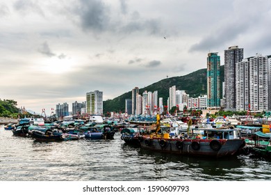 Hong Kong -July 26, 2019: Traditional Fishing Trawler In The Aberdeen Bay. Famous Floating Village In Aberdeen Is An Area And Town On The South Shore Of HongKong Island