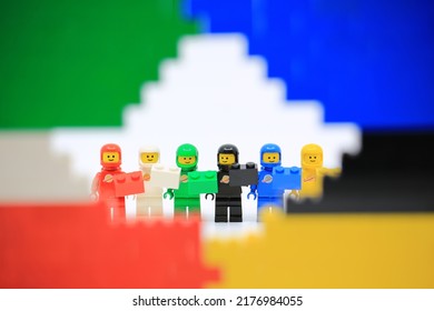 Hong Kong - July 4 2022: Six People In Red, Black, Blue, Yellow, White And Black Color Make As A Team And Dress Like Astronaut