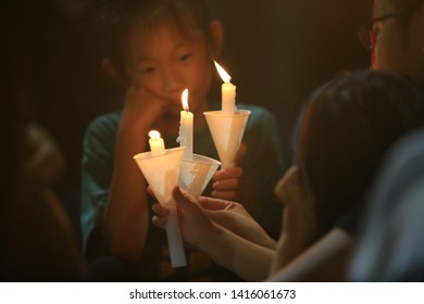 Hong Kong, June 4 2019: People Join The Memorials For The Tiananmen Square Protests Of 1989 In Victoria Park On 4 June 2014. 