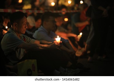 Hong Kong, June 4 2019: People Join The Memorials For The Tiananmen Square Protests Of 1989 In Victoria Park On 4 June 2014. 