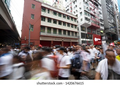 HONG KONG - JUNE 9, 2019: Protesters March In Front Of A Fire Station. 
Thousands Of Protesters Marched Against A Controversial Extradition Bill. 