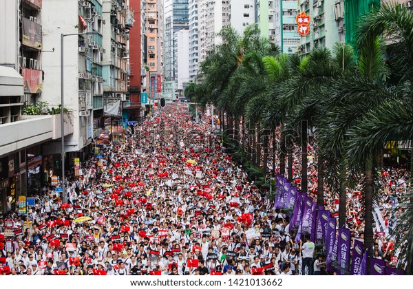 HONG KONG - June 9th\
2019: Anti-Extradition Bill Demonstration in Hong Kong. The\
fugitive law amendment sparks 1.03 million people protest on the\
street, as organiser says.