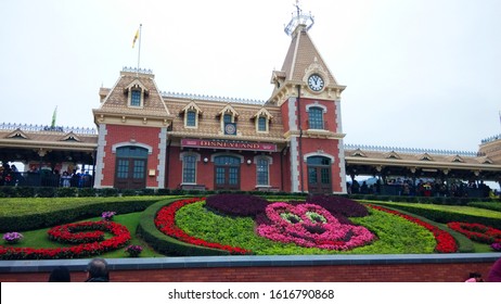 Hong Kong - March 14, 2016 : Hong Kong Mickey Mouse Disneyland Train Station and Pink Floral Mickey In front of building