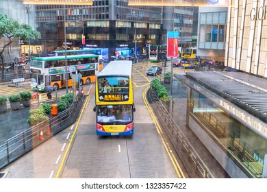 HONG KONG - MAY 10, 2014: City Traffic With Cars And Taxis. Hong Kong Hosts 10 Million Tourists Every Year.