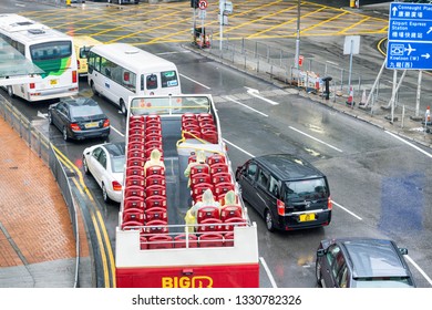 HONG KONG - MAY 10, 2014: City Traffic With Cars And Buses. Hong Kong Hosts 10 Million Tourists Every Year.