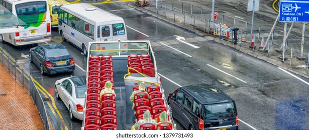 HONG KONG - MAY 10, 2014: City Traffic With Cars And Buses. Hong Kong Hosts 10 Million Tourists Every Year.