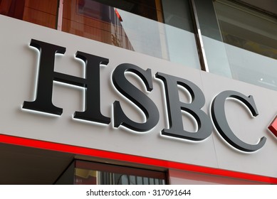 HONG KONG- MAY 8, 2015: HSBC Bank Logo In Hong Kong - HSBC Is A British Multinational Banking And Financial Services And Headquartered In London.