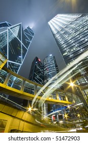 Hong Kong At Night With Highrise Buildings