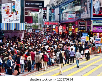 HONG KONG -NOV 24: Shoppers and visitors crowd at a shopping street on Nov 24, 2012 in Hong Kong, China. There are more than 35 million of visitors arrived Hong Kong from January to September 2012.