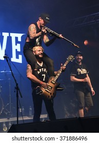 HONG KONG - NOVEMBER 29,2015: Clockenflap 2015, Obey The Brave, Guitarist Climbed To The Other Member In An Exciting Mood