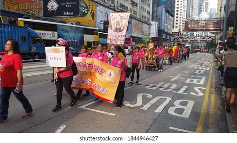 HONG KONG - October 24 2015: Participants At A Charity Walk March  Parade On The Streets Of Hong Kong Around The Causeway Bay Area.