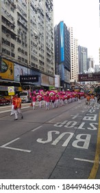 HONG KONG - October 24 2015: Participants At A Charity Walk March  Parade On The Streets Of Hong Kong Around The Causeway Bay Area.