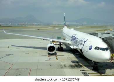 HONG KONG - OCTOBER 25, 2019: Air Plane Of Cathay Pacific With One World Alliance Logo Is Parking In Hong Kong International Airport In Chek Lap Kok.