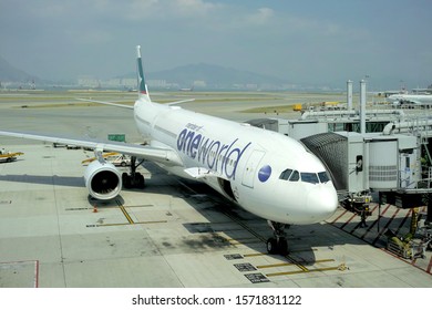 HONG KONG - OCTOBER 25, 2019: Air Plane Of Cathay Pacific With One World Alliance Logo Is Parking In Hong Kong International Airport In Chek Lap Kok.