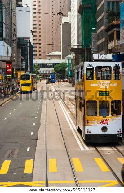 HONG KONG - OCTOBER\
25: Public transport on the street on October 25, 2015 in Hong\
Kong. Over 90% daily travelers use public transport. Its the\
highest rank in the world.