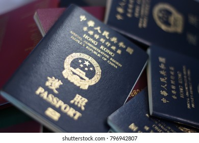 Hong Kong Passport In Pile Of Passports.solf Focus