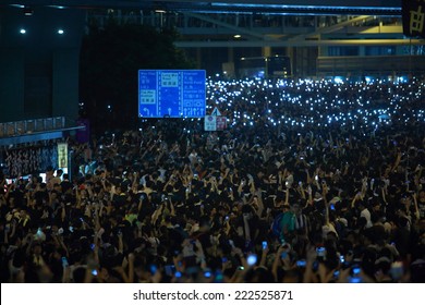 HONG KONG, SEPT.29: protesters wave the mobiles in Admiralty on 29 September 2014. after riot police fire tear shell to the peaceful protesters on 28 sept, more people join the protest