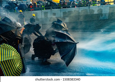 
Hong Kong - September 15, 2019: Hong Kong Police Use Water Cannon On Protesters.