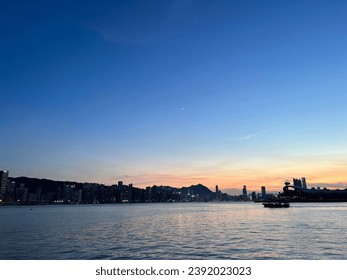 The Hong Kong skyline against the backdrop of the sea and sunset is truly mesmerizing.