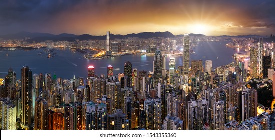 Hong Kong Skyline Panorama At Dramatic Sunset, China - Asia